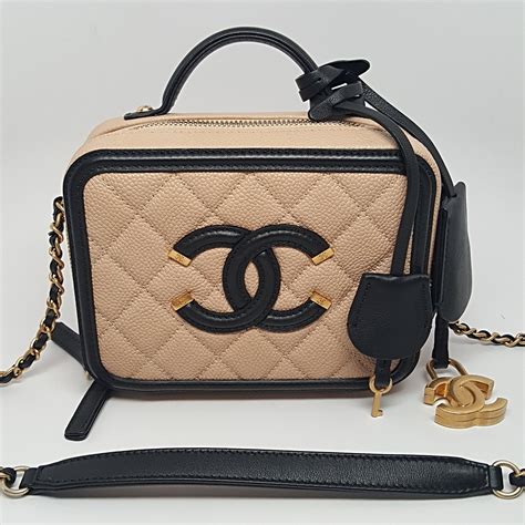 chanel vanity case beige and black|Chanel vanity bag vintage.